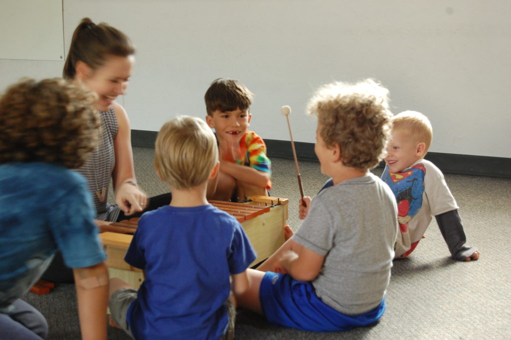 Kids playing music together. Music helps foster connection.