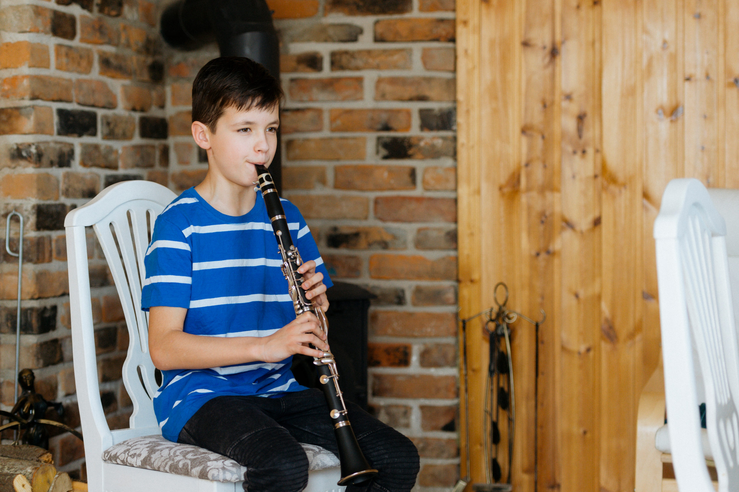 image of boy playing clarinet | clarinet lessons colorado 