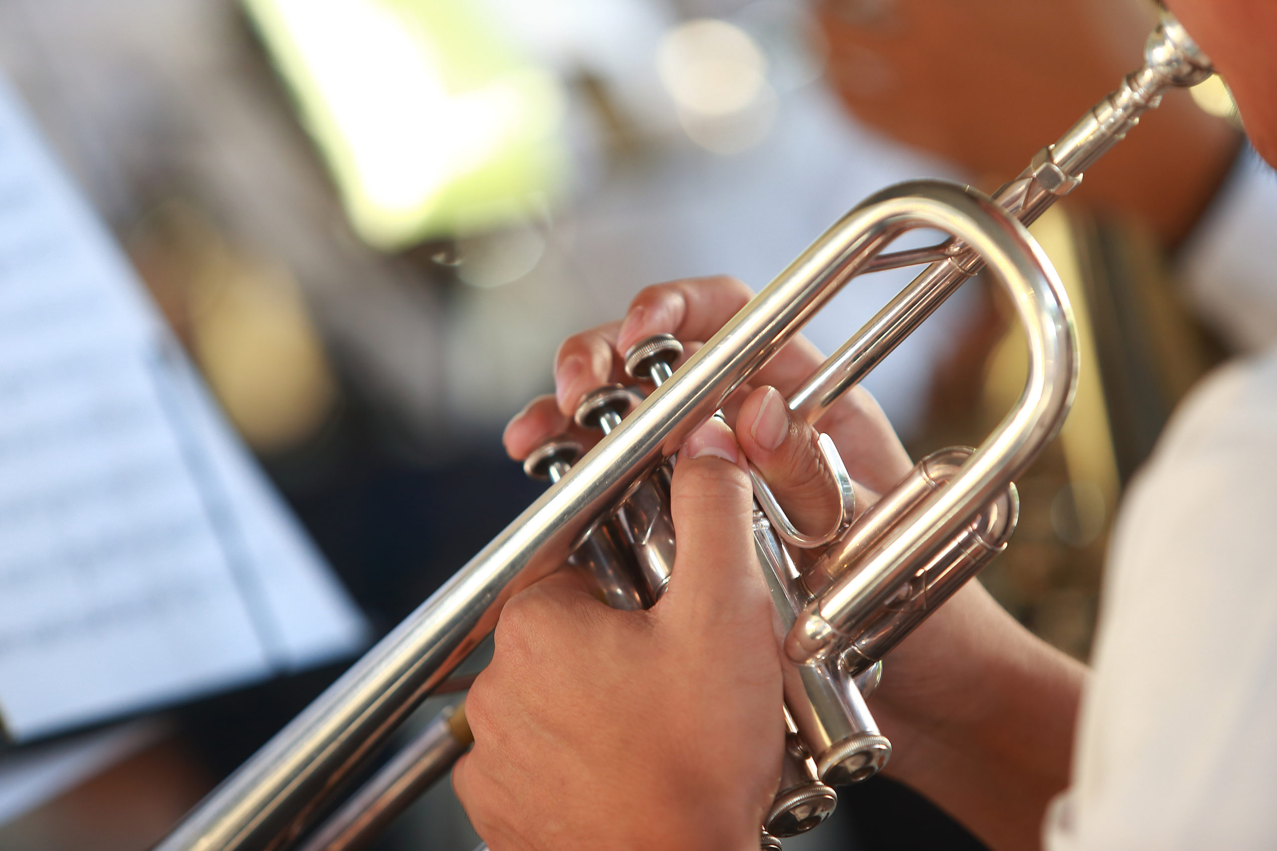 photo of hands playing trumpet | Colorado trumpet lessons beginners